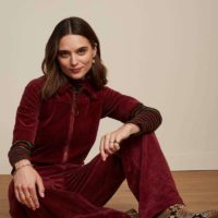 Garbo Corduroy Zip Jumpsuit sitting